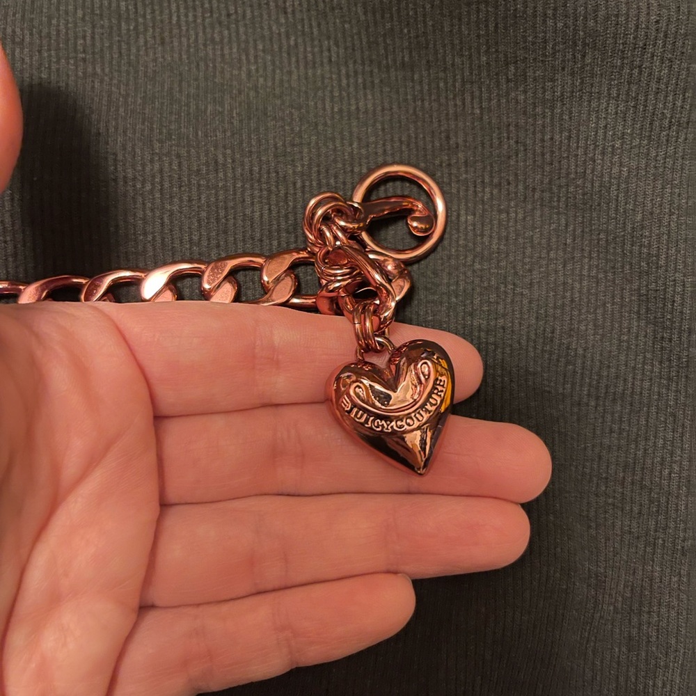 Metallic Pink Juicy Couture bracelet. Without out tags and no box.